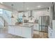 Modern kitchen with stainless steel appliances, a large center island, and ample cabinet space, great for cooking at 4314 Cotton Flat Rd, Summerville, SC 29485
