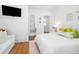Inviting bedroom with a serene ambiance, plush bedding, and access to an ensuite bathroom at 441 Elfes Field Ln, Charleston, SC 29492