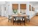 Inviting dining room showcasing natural light, window coverings, and seating for four at 441 Elfes Field Ln, Charleston, SC 29492