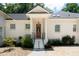 Charming home with a welcoming entrance featuring a classic wood door and manicured landscaping at 441 Elfes Field Ln, Charleston, SC 29492
