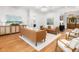 Bright living room with hardwood floors, stylish furnishings, and elegant decor at 441 Elfes Field Ln, Charleston, SC 29492