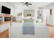 Bright living area with comfortable seating, built-in shelving, and a cozy fireplace at 441 Elfes Field Ln, Charleston, SC 29492