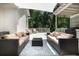 Relaxing outdoor living area featuring comfortable seating and a view of the backyard at 441 Elfes Field Ln, Charleston, SC 29492