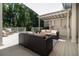 Spacious outdoor patio with comfortable seating, ceiling fan, and outdoor kitchen area, perfect for enjoying the outdoors at 441 Elfes Field Ln, Charleston, SC 29492