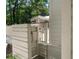 Private outdoor shower adds a touch of luxury, conveniently located near the outdoor living space at 441 Elfes Field Ln, Charleston, SC 29492