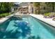 Stunning backyard pool featuring crystal clear water, patio area, and lush landscaping at 441 Elfes Field Ln, Charleston, SC 29492