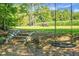 Expansive backyard featuring a rope swing, tree, and open space at 4428 Maple Ridge Rd, Walterboro, SC 29488