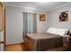 Cozy bedroom with hardwood floors and a queen bed at 4428 Maple Ridge Rd, Walterboro, SC 29488