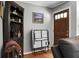 Entryway with hardwood floors, grey walls, and a dark wood front door at 4428 Maple Ridge Rd, Walterboro, SC 29488