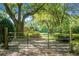 Gated entry to this tree lined brick home at 4428 Maple Ridge Rd, Walterboro, SC 29488