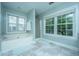 Relaxing bathroom featuring a soaking tub, a walk-in shower, and serene backyard views at 468 Maple Oak Ln, Charleston, SC 29414