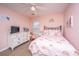 Charming bedroom with a ceiling fan and playful decorations at 468 Maple Oak Ln, Charleston, SC 29414