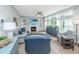 Inviting living room with fireplace, built-in shelving, and an abundance of natural light at 468 Maple Oak Ln, Charleston, SC 29414