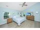 Spacious main bedroom with a vaulted ceiling, large windows, and a comfortable bed at 468 Maple Oak Ln, Charleston, SC 29414