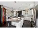 Eat-in kitchen with large island, subway tile, and dining table at 5017 W Liberty Park Cir, North Charleston, SC 29405