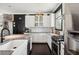 Bright kitchen with subway tile backsplash, stainless steel appliances and modern cabinets at 5017 W Liberty Park Cir, North Charleston, SC 29405