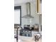 Well-equipped kitchen with stainless steel appliances, gas range, and subway tile backsplash at 5017 W Liberty Park Cir, North Charleston, SC 29405