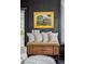Cozy living room bench with soft pillows, antique chest and artwork at 5017 W Liberty Park Cir, North Charleston, SC 29405