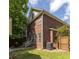 Expansive backyard featuring a well-maintained lawn, offering plenty of space for outdoor activities at 5110 Hyde Park Village Ln, North Charleston, SC 29405