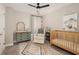 Cozy Bedroom with a crib, changing table, and neutral decor at 5110 Hyde Park Village Ln, North Charleston, SC 29405