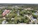 Aerial view of a neighborhood with lush tree cover and various building types, showcasing the community's character at 512 Whilden St, Mount Pleasant, SC 29464