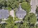 Aerial view of the property showcasing its placement within a tree-filled neighborhood at 512 Whilden St, Mount Pleasant, SC 29464