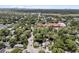 An aerial view of the neighborhood with lush trees and waterway at 512 Whilden St, Mount Pleasant, SC 29464