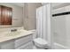 Bathroom featuring a white vanity, a toilet, and a shower with a white curtain at 512 Whilden St, Mount Pleasant, SC 29464