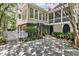 Exterior view of home with stone patio, garden, and back entrance at 512 Whilden St, Mount Pleasant, SC 29464