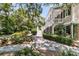 Home exterior with a staircase leading to the porch and manicured landscaping at 512 Whilden St, Mount Pleasant, SC 29464