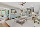 Spacious living room with a fireplace, hardwood floors, and an open layout at 512 Whilden St, Mount Pleasant, SC 29464