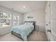 Serene bedroom with natural light, calming blue accents, and a tranquil ambiance at 513 Richfield Way, Summerville, SC 29486