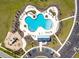 Overhead aerial shot of the community pool, playground, and parking lot in a beautiful neighborhood at 513 Richfield Way, Summerville, SC 29486