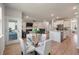 Open concept dining room and living room with access to the kitchen and outdoor patio at 513 Richfield Way, Summerville, SC 29486