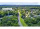 Aerial view of a serene community near the Whitehall Amenity Center with lush trees and well-maintained properties at 5406 E Crosland Ct, North Charleston, SC 29420