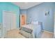 Cozy bedroom featuring a queen-sized bed, closet, and soft carpet for a relaxing retreat at 5406 E Crosland Ct, North Charleston, SC 29420
