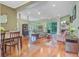 Expansive living room with gleaming hardwood floors, a fireplace, and an open floor plan at 5406 E Crosland Ct, North Charleston, SC 29420