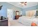Spacious main bedroom showcasing ensuite bathroom, closet, and neutral color palette at 5406 E Crosland Ct, North Charleston, SC 29420