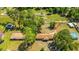 Aerial view of a quaint home featuring a well-kept yard and charming brick exterior at 565 Estates Dr, Walterboro, SC 29488