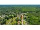 Comprehensive aerial perspective of a residential zone adjacent to a dense tree line, offering a blend of greenery at 565 Estates Dr, Walterboro, SC 29488