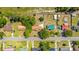 Overhead shot featuring neat homes, green lawns, and a shared street with some houses including backyard pools at 565 Estates Dr, Walterboro, SC 29488