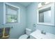 This bathroom offers a single sink vanity, and a window at 565 Estates Dr, Walterboro, SC 29488
