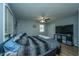 Spacious bedroom with wood floors, ceiling fan, and natural light at 565 Estates Dr, Walterboro, SC 29488