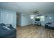 Large living room with wood-look floors, a ceiling fan, and comfortable seating at 565 Estates Dr, Walterboro, SC 29488