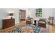 Spacious living room with hardwood floors, a patterned rug, and comfortable seating at 6 Sayle Rd, Charleston, SC 29407