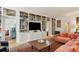 Spacious living room with stylish sofa and floor to ceiling shelving for ample storage at 6 Sayle Rd, Charleston, SC 29407