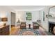 Elegant living room with hardwood floors, fireplace, and comfortable seating at 6 Sayle Rd, Charleston, SC 29407
