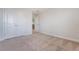 Carpeted bedroom with double door closet and doorway leading to hallway at 602 Yellow Leaf Ln, Summerville, SC 29486