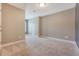 Bedroom features neutral walls, carpet, and doorways with an entry closet at 602 Yellow Leaf Ln, Summerville, SC 29486