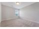 A carpeted bedroom with neutral walls and a window offering natural light at 602 Yellow Leaf Ln, Summerville, SC 29486